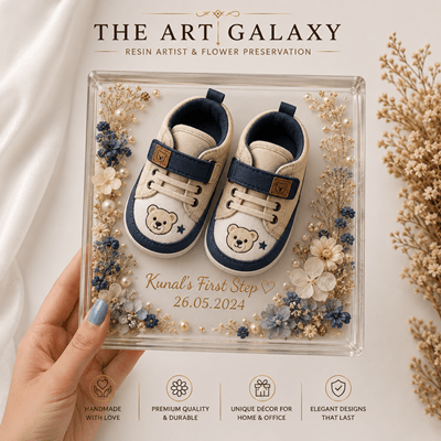 Baby shoes preserved in a resin keepsake block by The Art Galaxy Baby shoes preserved in a resin keepsake block by The Art Galaxy