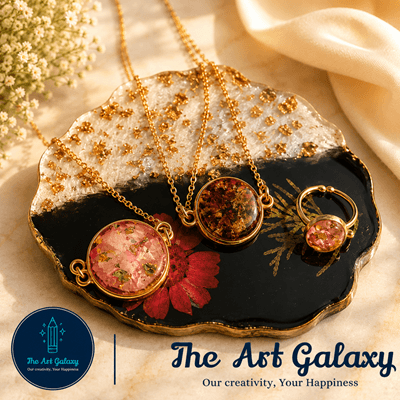 Collection of handmade resin jewellery pieces with real preserved flowers