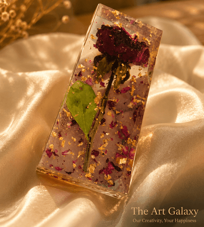 Preserved red roses from a bouquet set in clear resin as a keepsake artwork